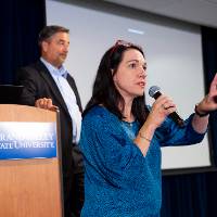 Two speakers beginning the oral presentations.